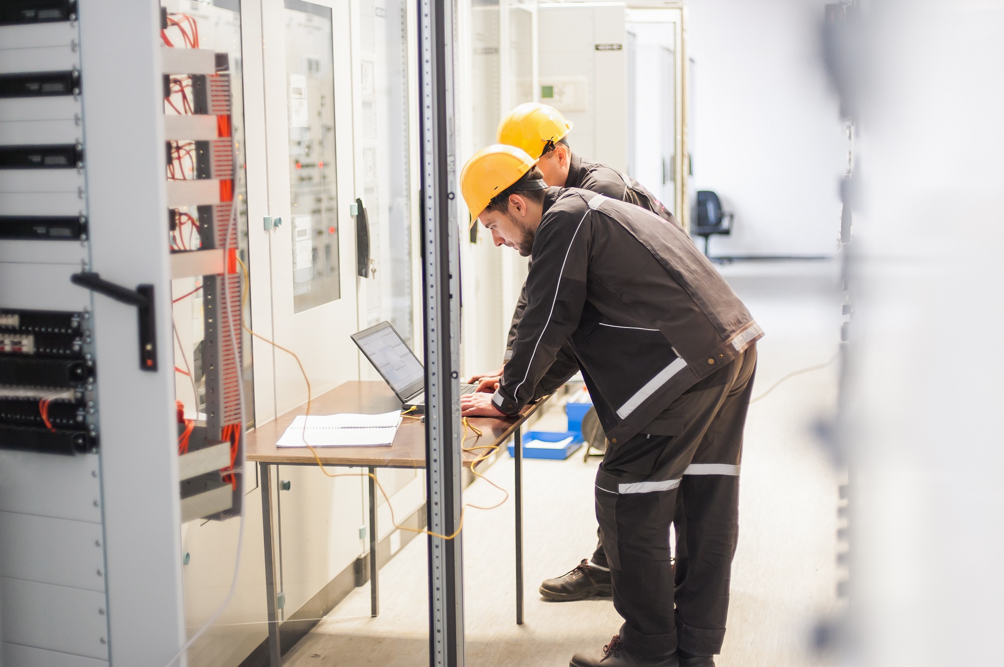 Field,Service,Crew,Engineers,Inspect,Relay,Protection,System,With,Laptop